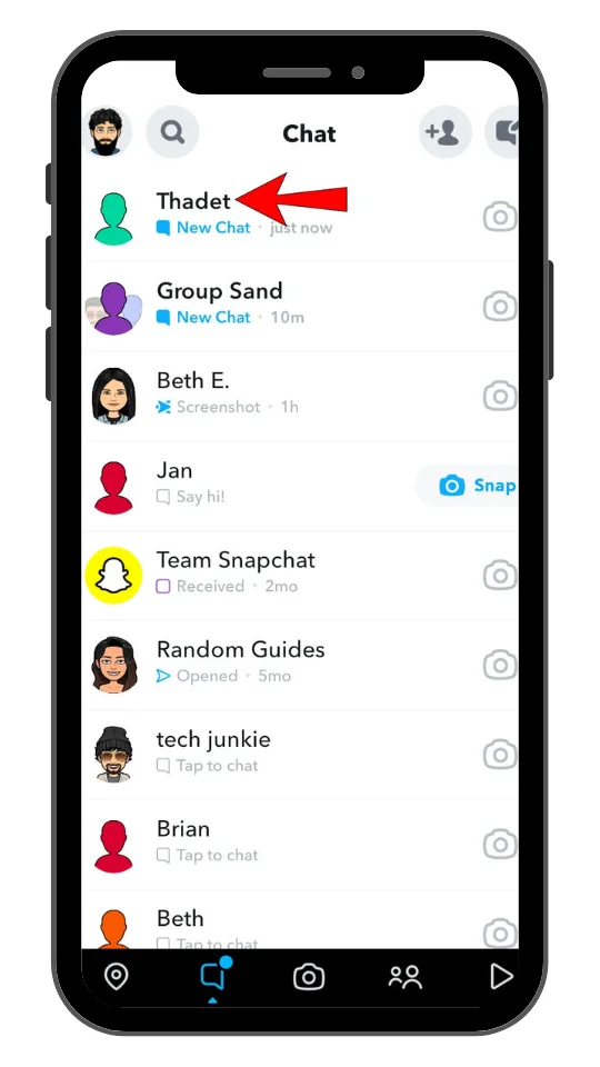 A smartphone screen showing the Snapchat chat list. A red arrow points to a contact named "Thadet" with a label "New Chat – just now." Other visible contacts include Group Sand, Beth E., Jan, Team Snapchat, Random Guides, tech junkie, Brian, and Beth. Some contacts have Bitmoji avatars, while others have colored default icons. The bottom navigation bar displays icons for Chat, Camera, Stories, Spotlight, and Map.