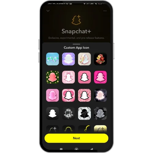 A smartphone screen displaying the Snapchat+ feature called "Custom App Icon." The interface shows multiple alternative Snapchat app icons in various colors and styles for users to choose from. At the bottom, there's a yellow "Next" button. The background is dark with the Snapchat+ logo and a description highlighting exclusive, experimental, and pre-release features.